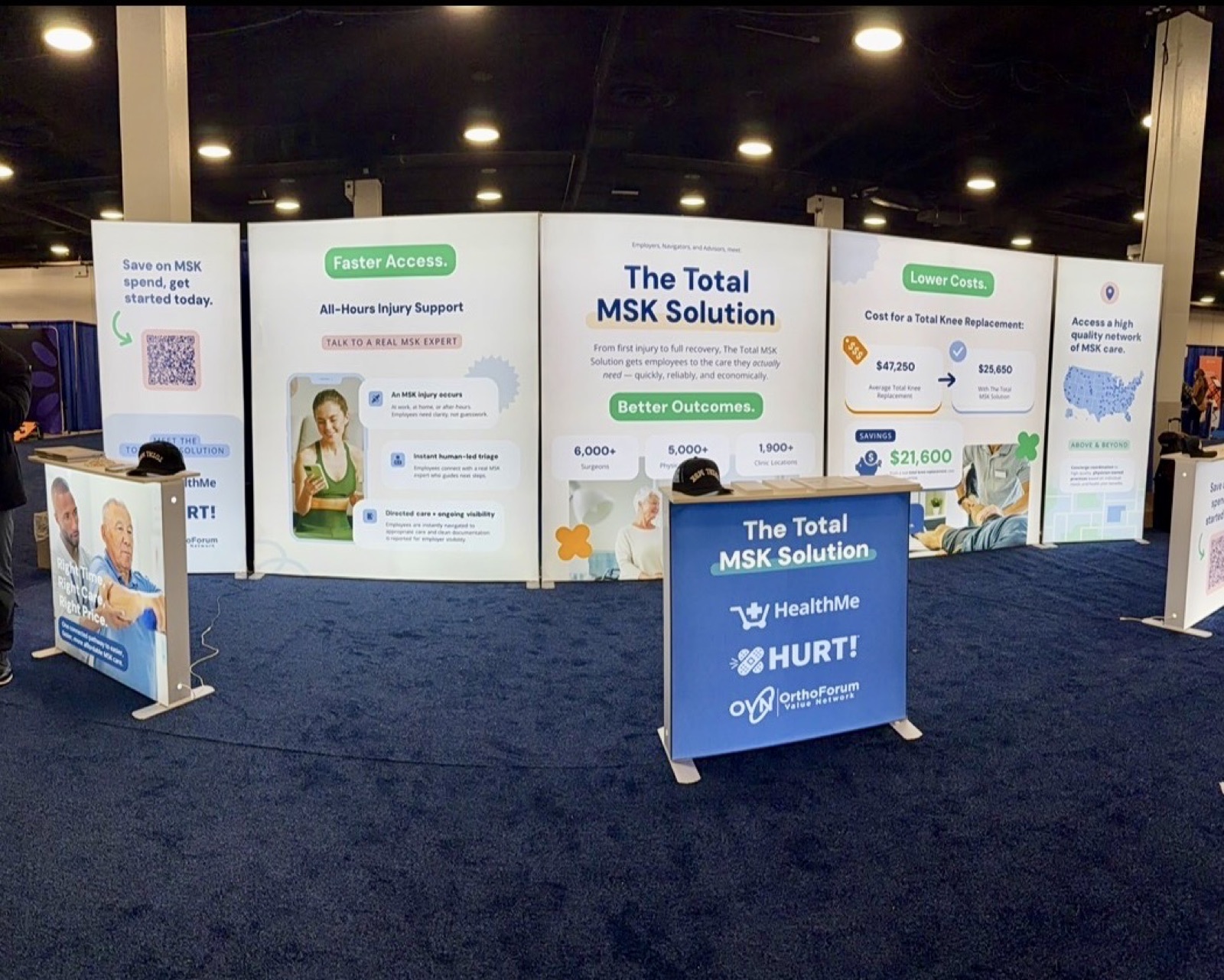 The Total MSK Solution booth display, showing faster access, lower costs, and better outcomes messaging